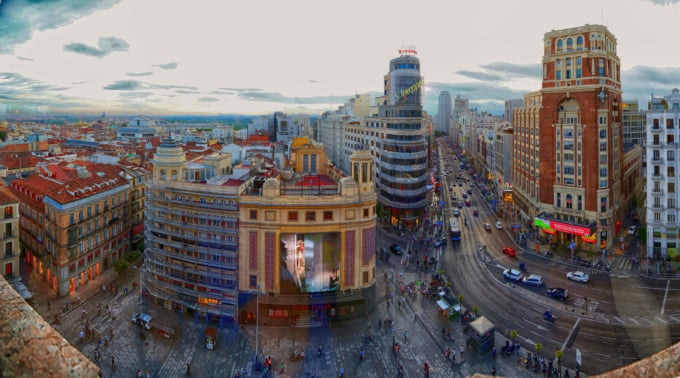 Gran Via famous street in Madrid and city view